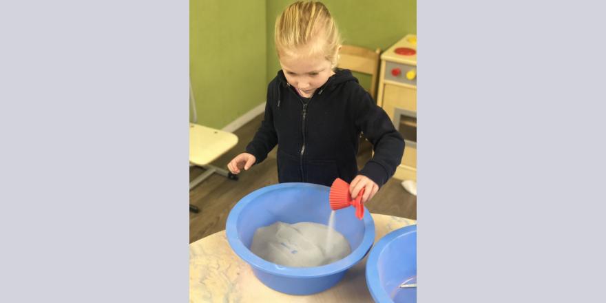 Playing with sand at preschool