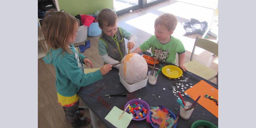 Kids doing crafts at preschool