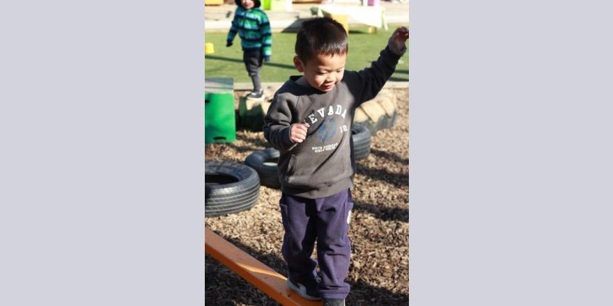 Boy playing in the playground at Annabel's Avonhead preschool.