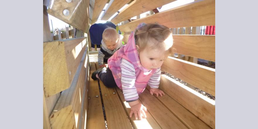 Playing in the tunnel at West Melton preschool