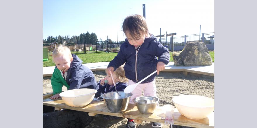 Making mud pies at preschool