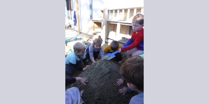 Kids building sandpit at Rangiora preschool